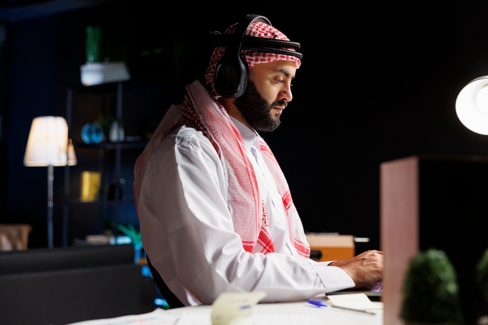 Arabian man utilizing wireless technology